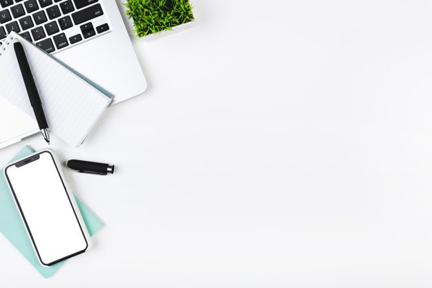 Premium Photo | Workplace with smartphone laptop and notebook